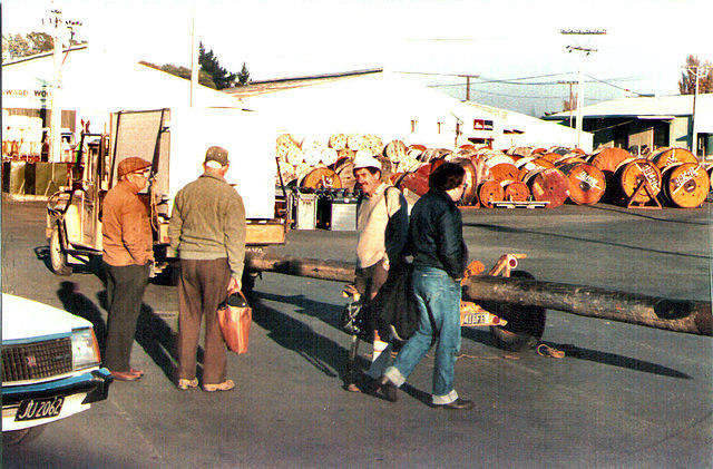 The crew getting ready for the trip to the site. Note the pole on the trailer