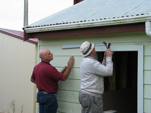 John ZL2JEL and Strath ZL2AAJ fixing up the hut